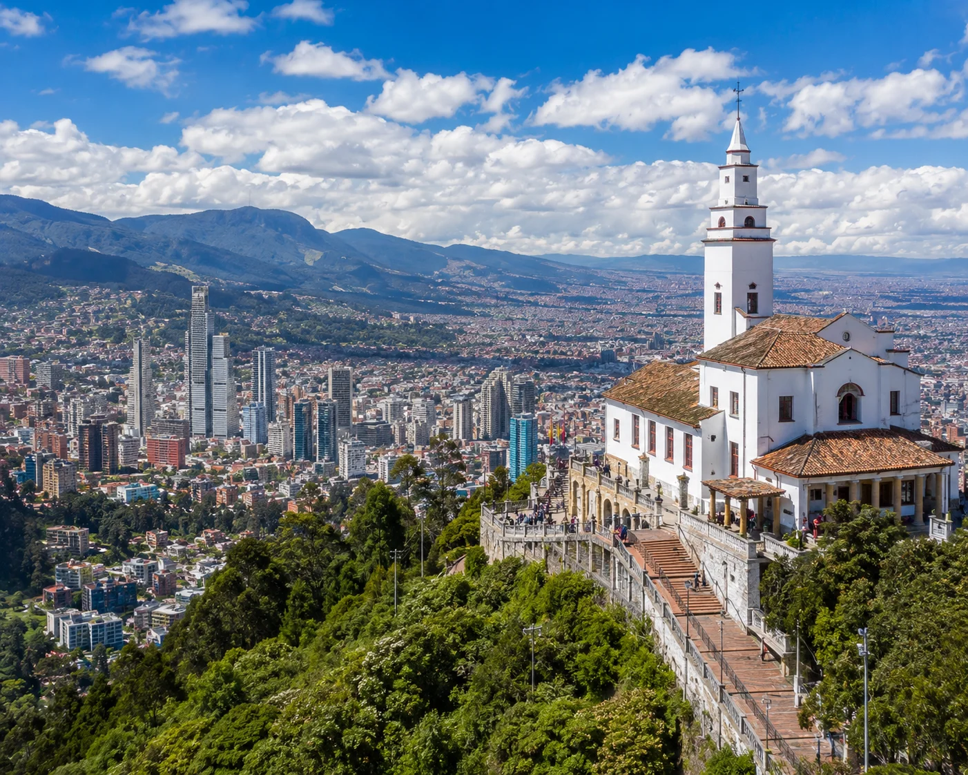 City valley view with historic church Bogota