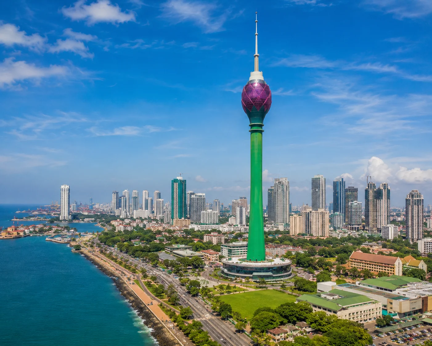 Vibrant coastal cityscape with landmark tower colombo